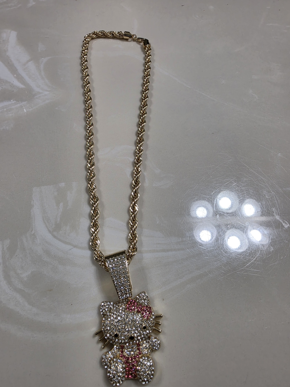 Hello Kitty Gold-Tone Crystal Pendant Necklace with Pink Accents New